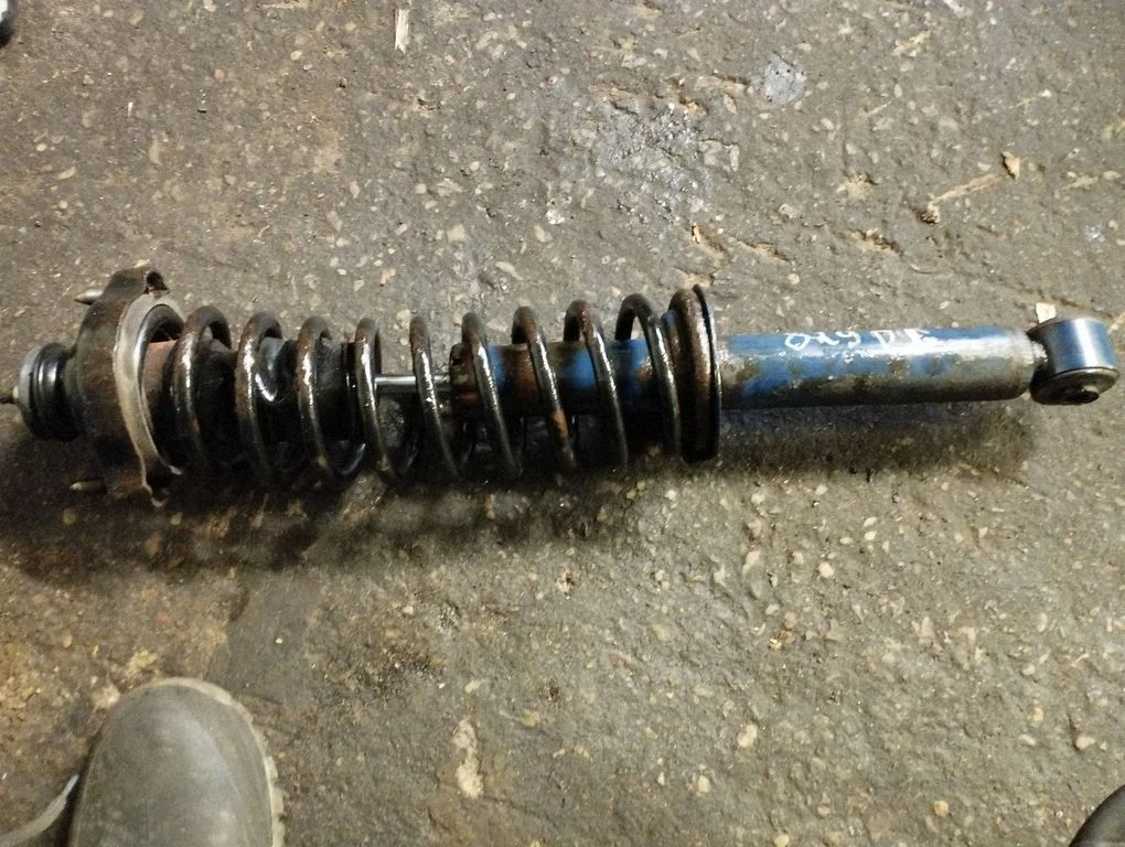 Rear shock absorber with coil spring – rear right