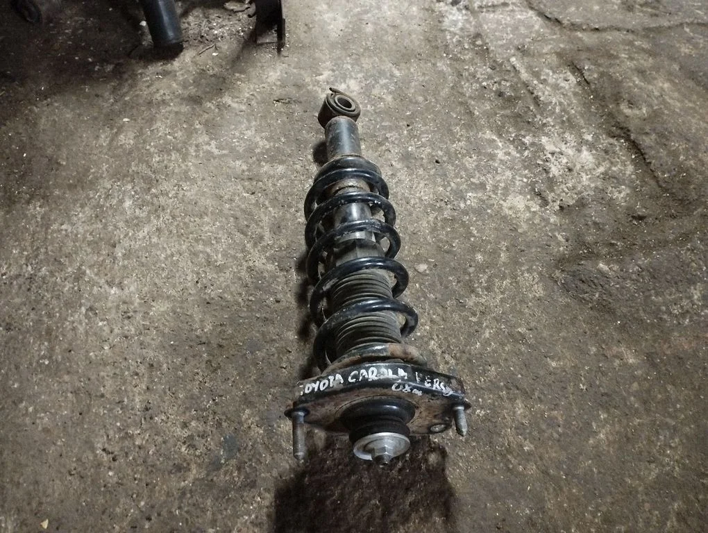Rear shock absorber with coil spring – rear right