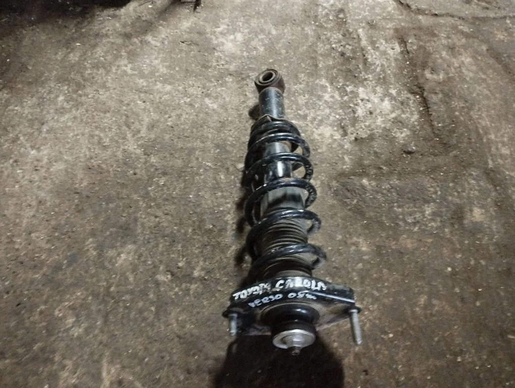 Rear shock absorber with coil spring – rear left