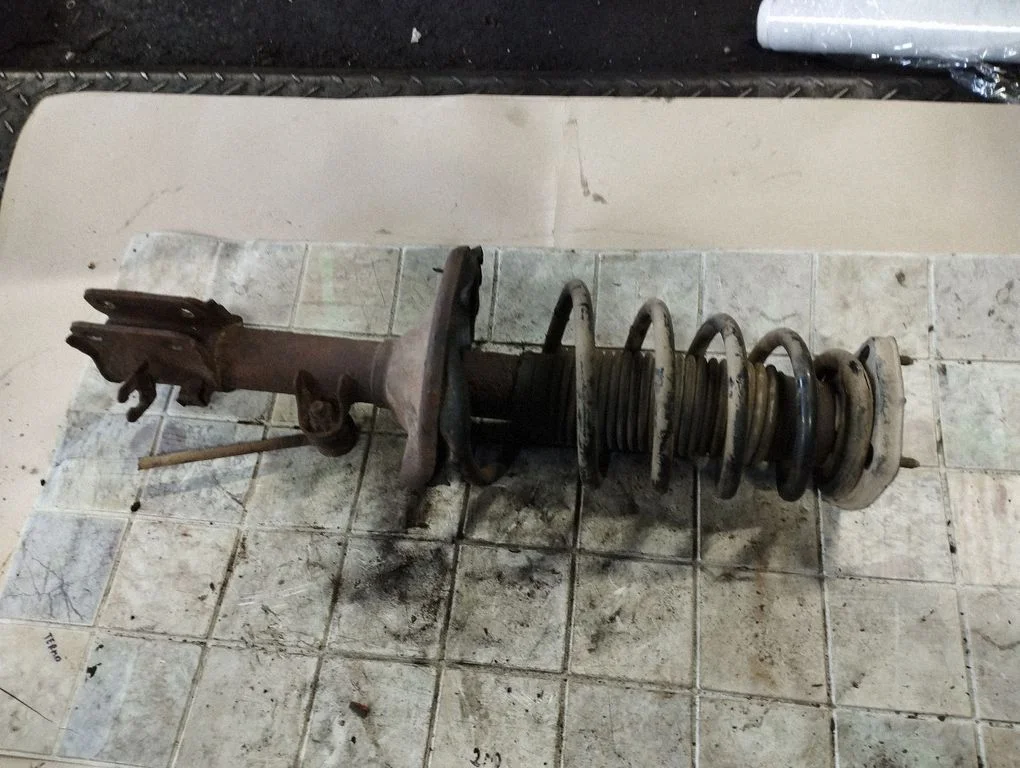 Rear shock absorber with coil spring – KIA Sportage (2005-2010)