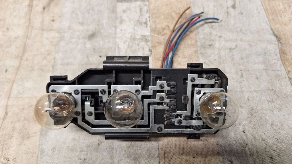 Tail light bulb cover holder BL3158B