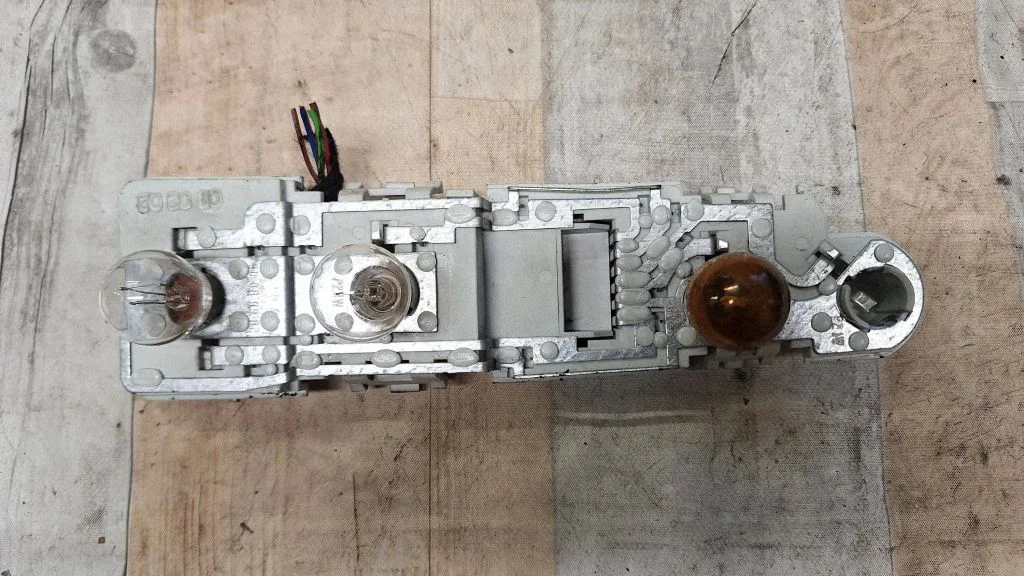 Tail light bulb cover holder 286622