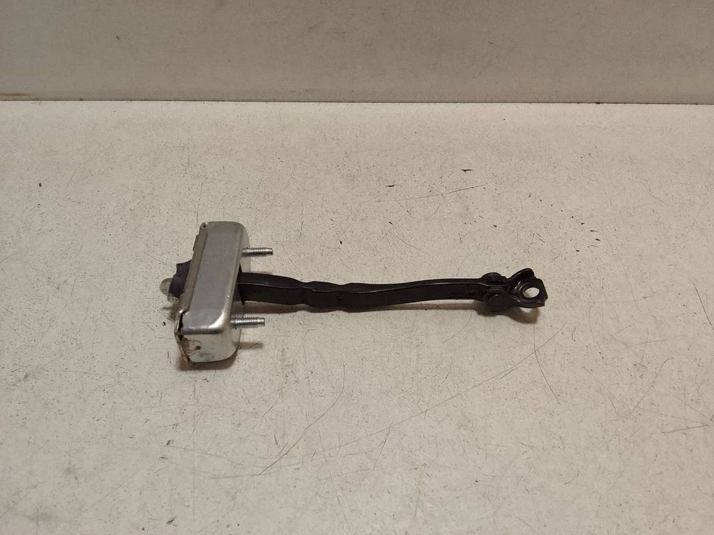 Front door check strap stopper – left