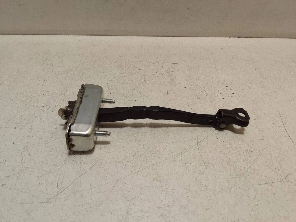 Front door check strap stopper – right