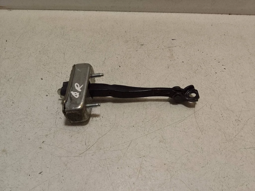 Rear door check strap stopper – right