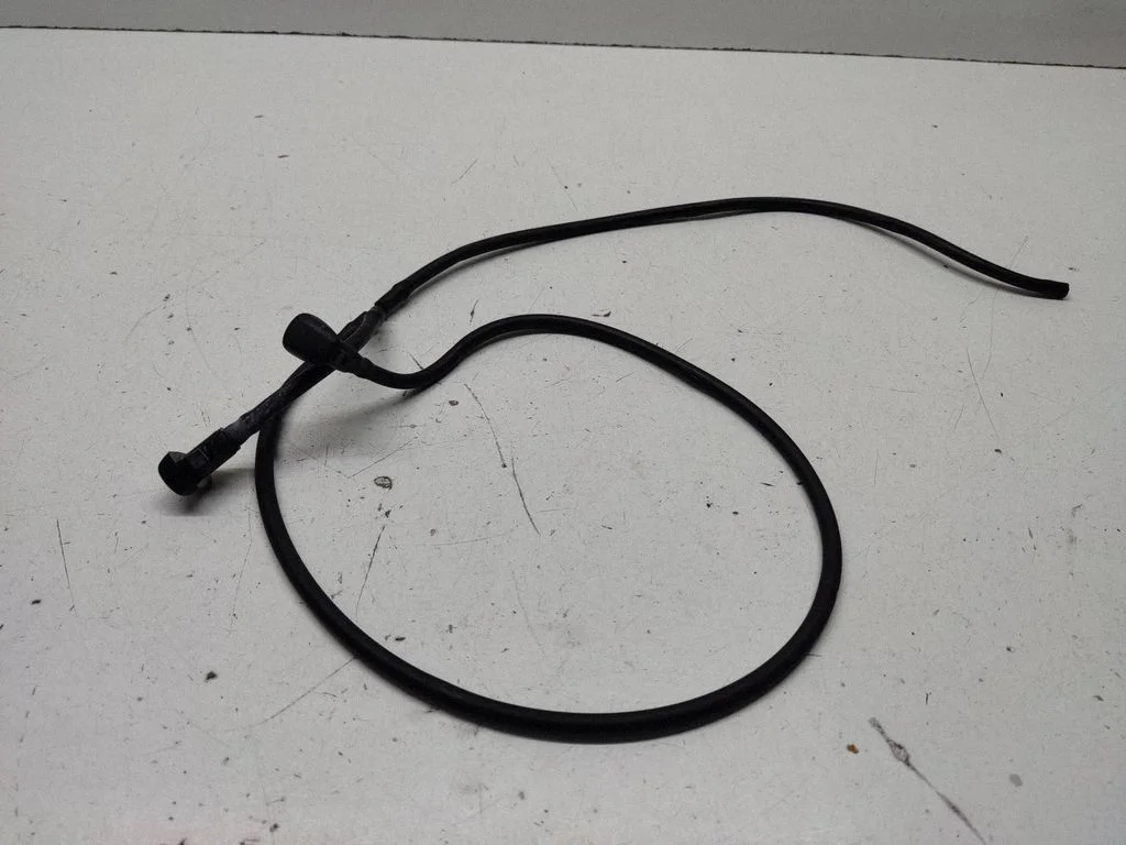 Windshield washer spray nozzle – front