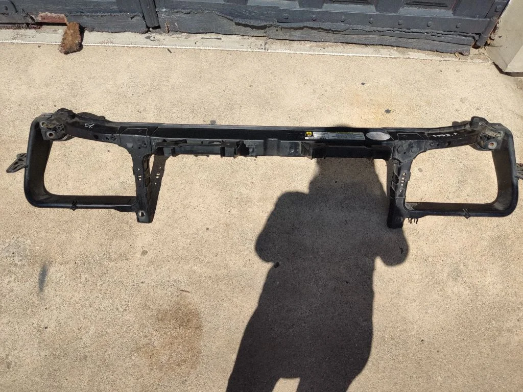 Radiator support slam panel 04596521AC