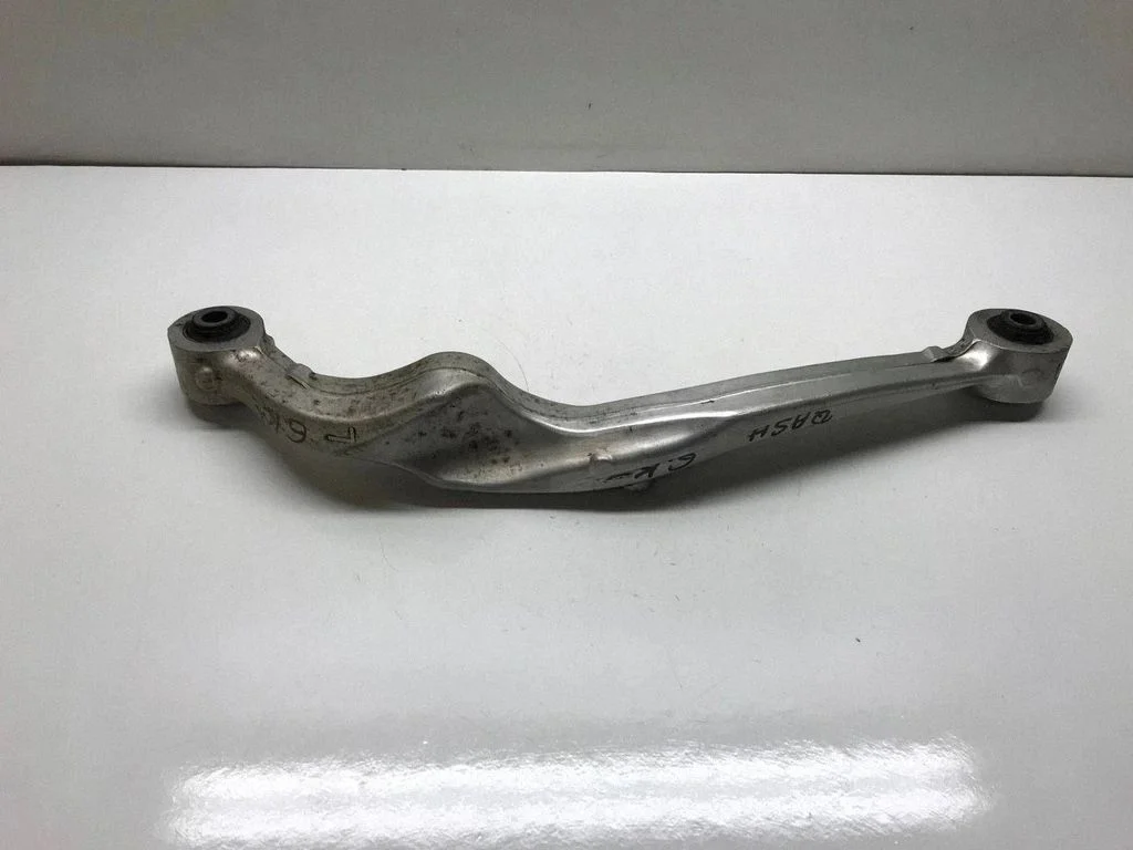 Rear upper control arm/wishbone – left