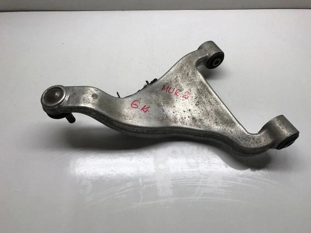 Rear upper control arm/wishbone – left