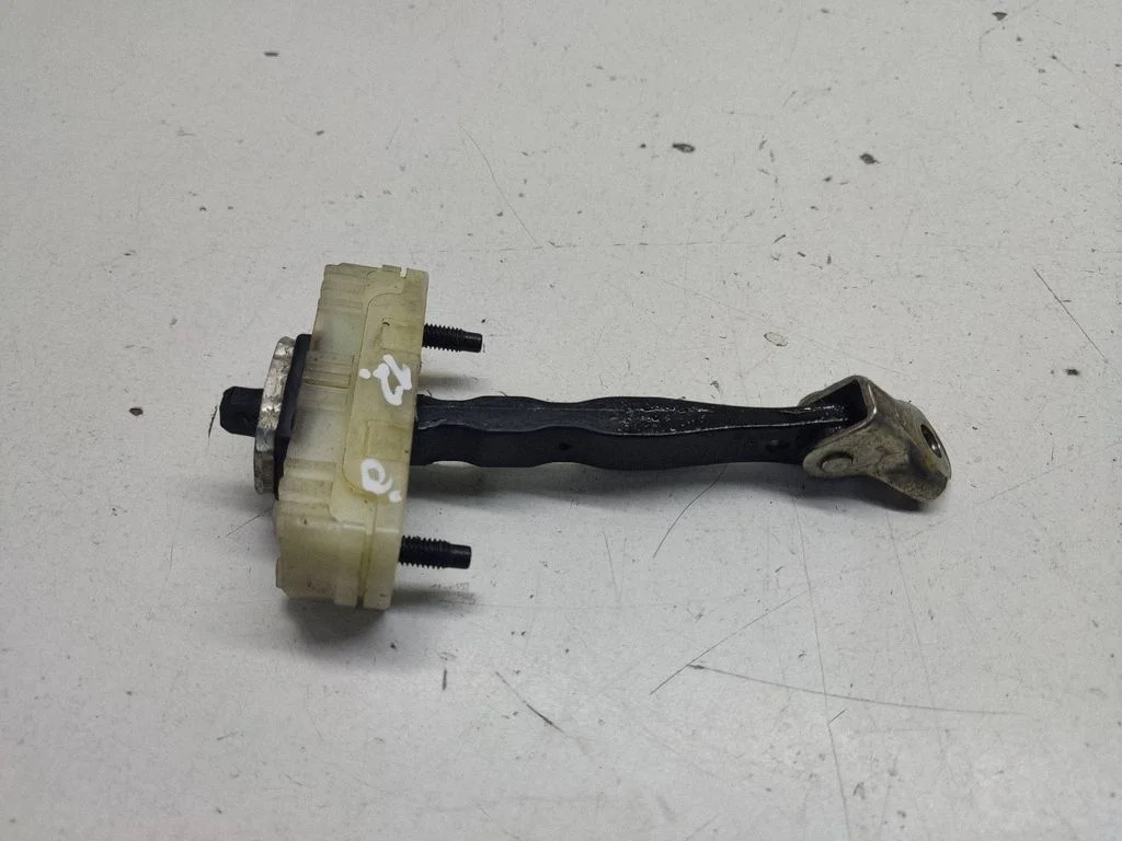 Front door check strap stopper – right