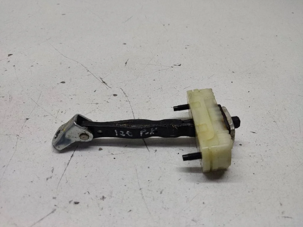 Front door check strap stopper – left