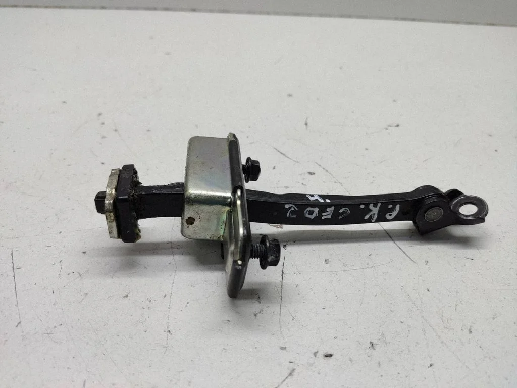 Front door check strap stopper – left