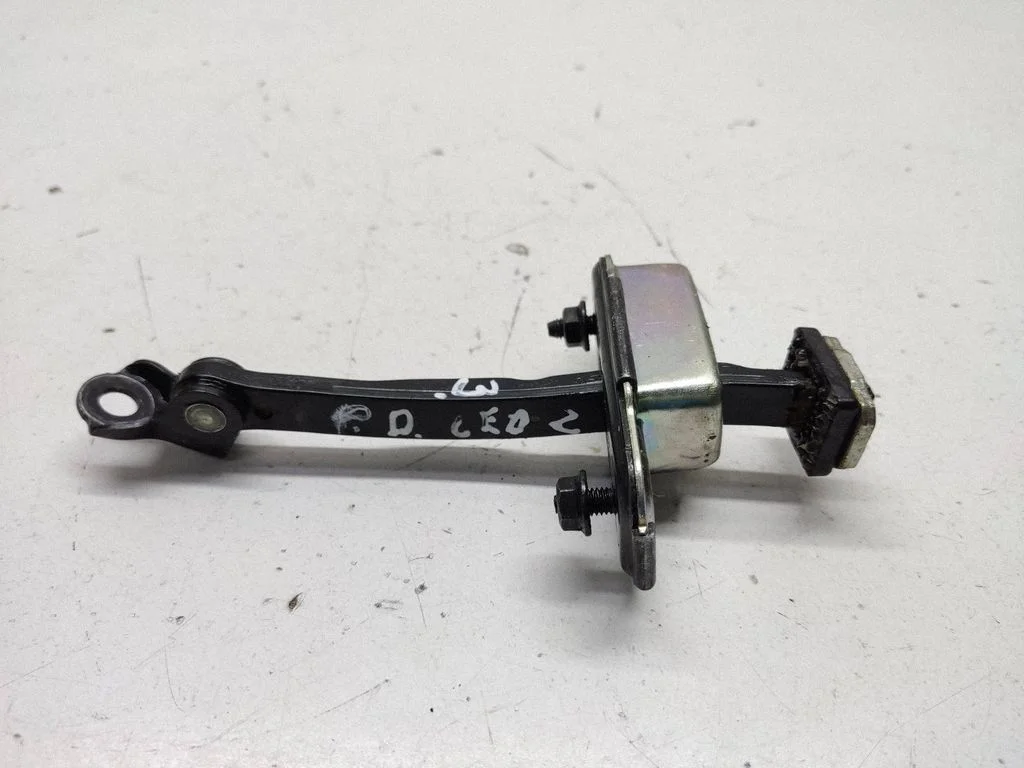 Front door check strap stopper – right