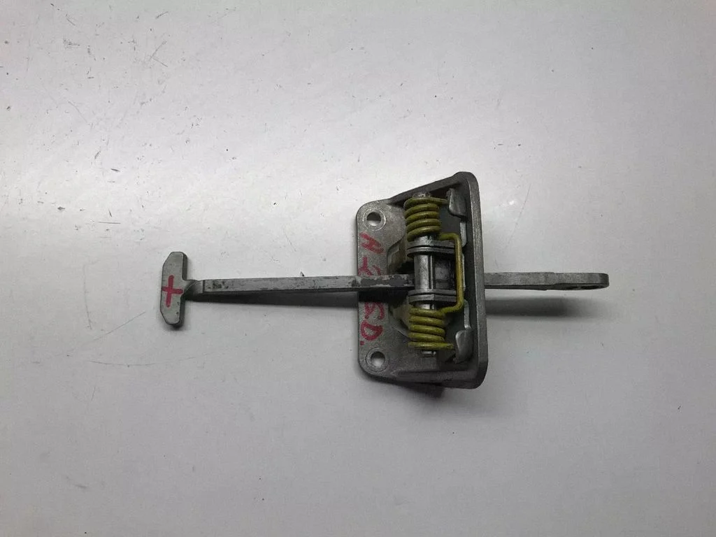 Rear door check strap stopper – right