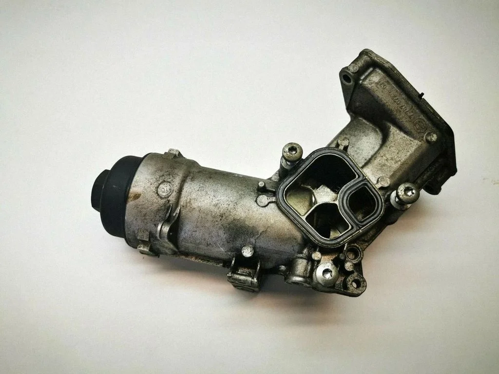 Oil filter mounting bracket 7787072