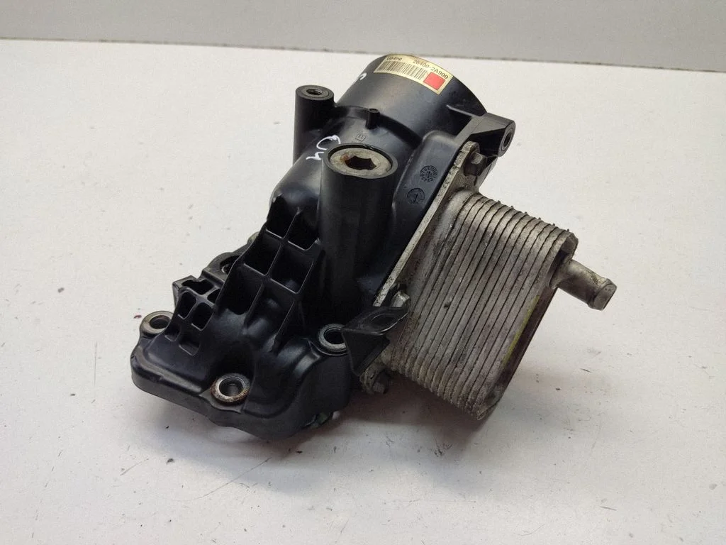 Oil filter mounting bracket 264102A400