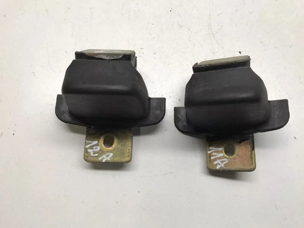 Sliding door check strap stopper