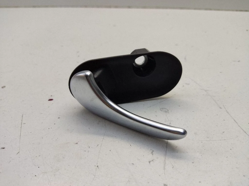 Rear door interior handle trim – Saab 9-5 (2006-2010)