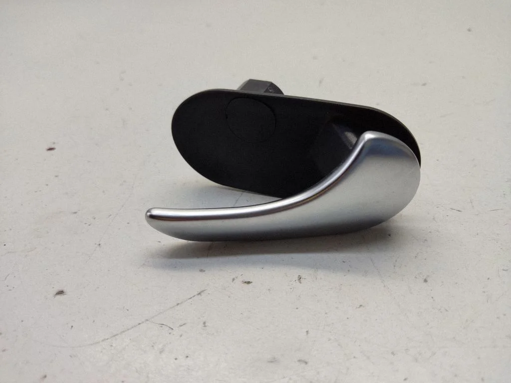 Rear door interior handle trim – Saab 9-5 (2006-2010)