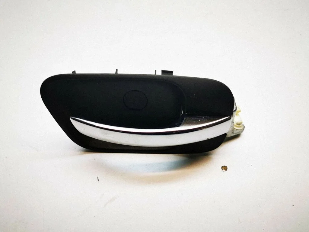 Rear door interior handle trim