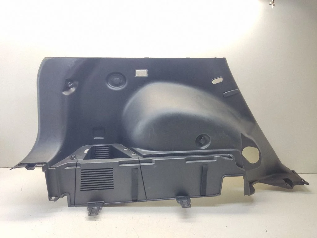 Trunk/boot lower side trim panel 857303U000