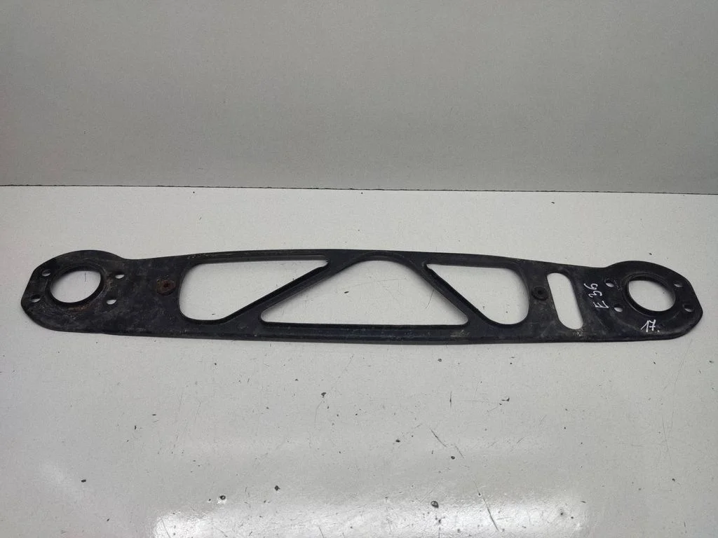 Radiator support slam panel bracket – front