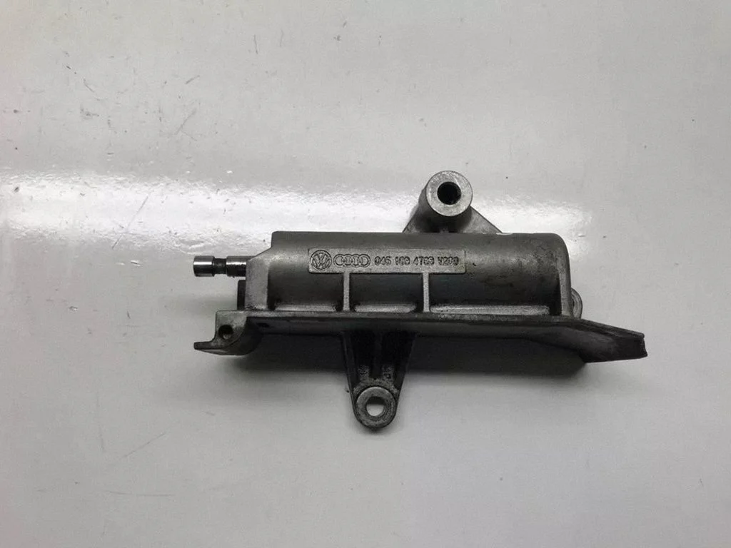 Timing belt/chain tensioner 045109478B