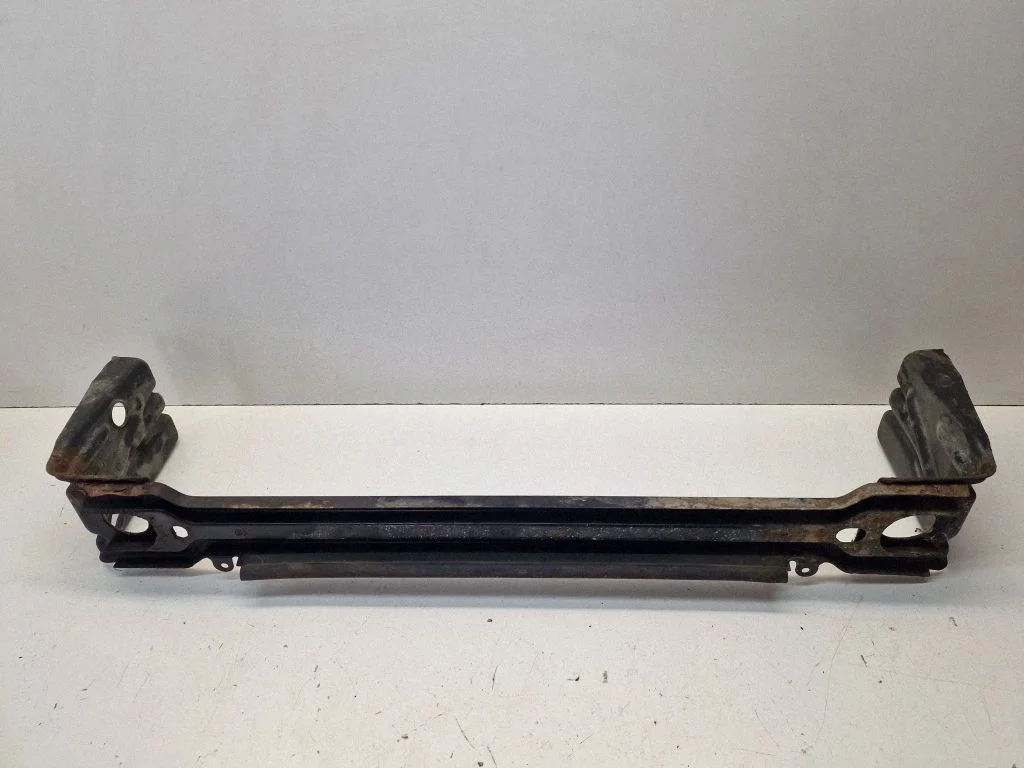Bottom radiator support slam panel