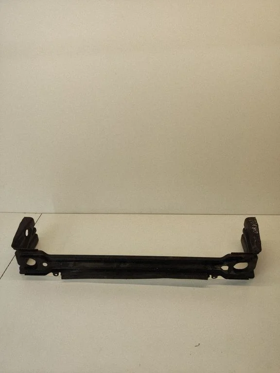 Bottom radiator support slam panel