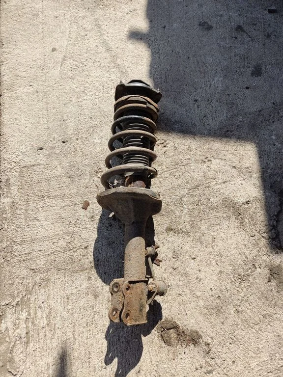 Rear shock absorber with coil spring – KIA Sportage (2005-2010)