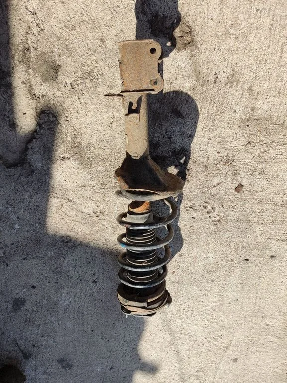 Rear shock absorber with coil spring – KIA Sportage (2005-2010)