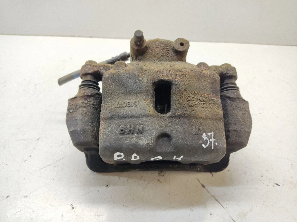 Front brake caliper – front right
