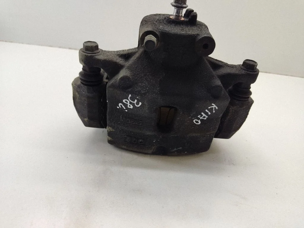 Front brake caliper – front right