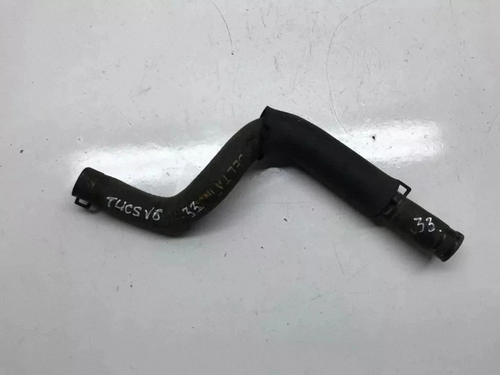 Engine coolant pipe/hose – front