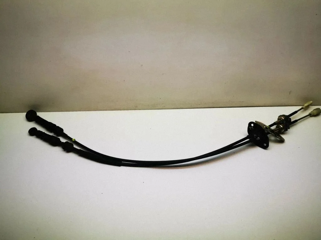 Gear shift cable linkage – front