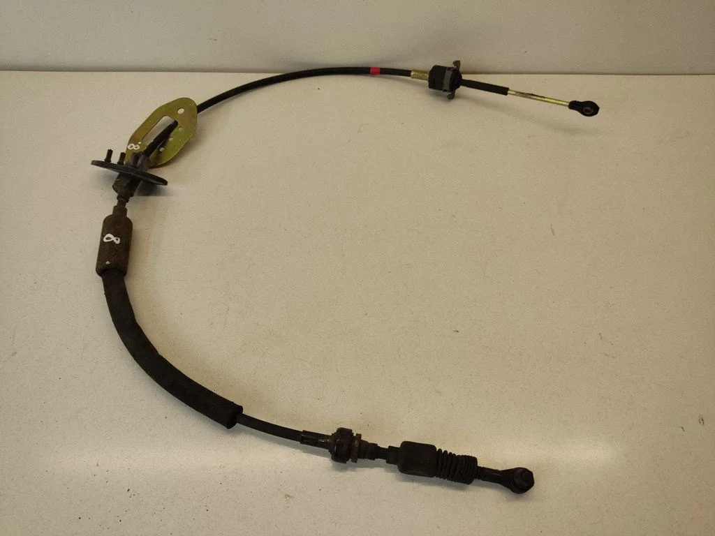 Gear shift cable linkage – front