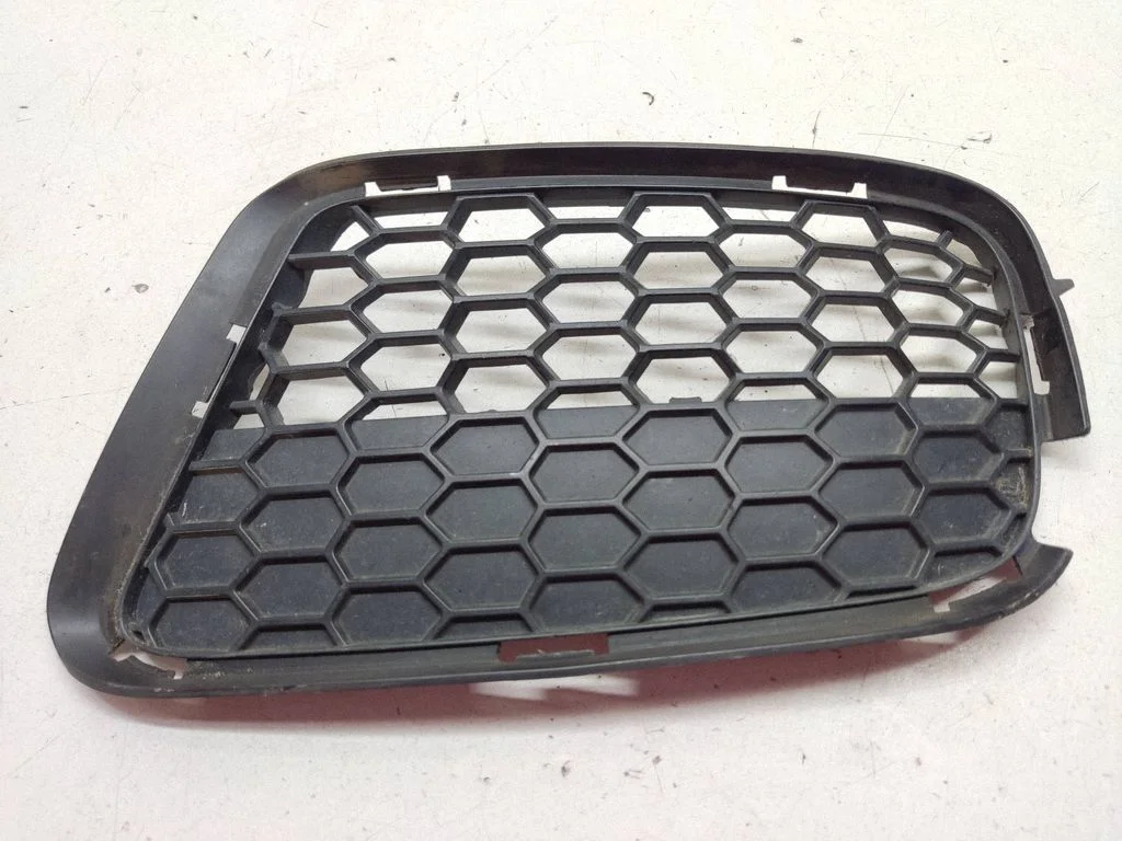 Front bumper lower grill 7845542