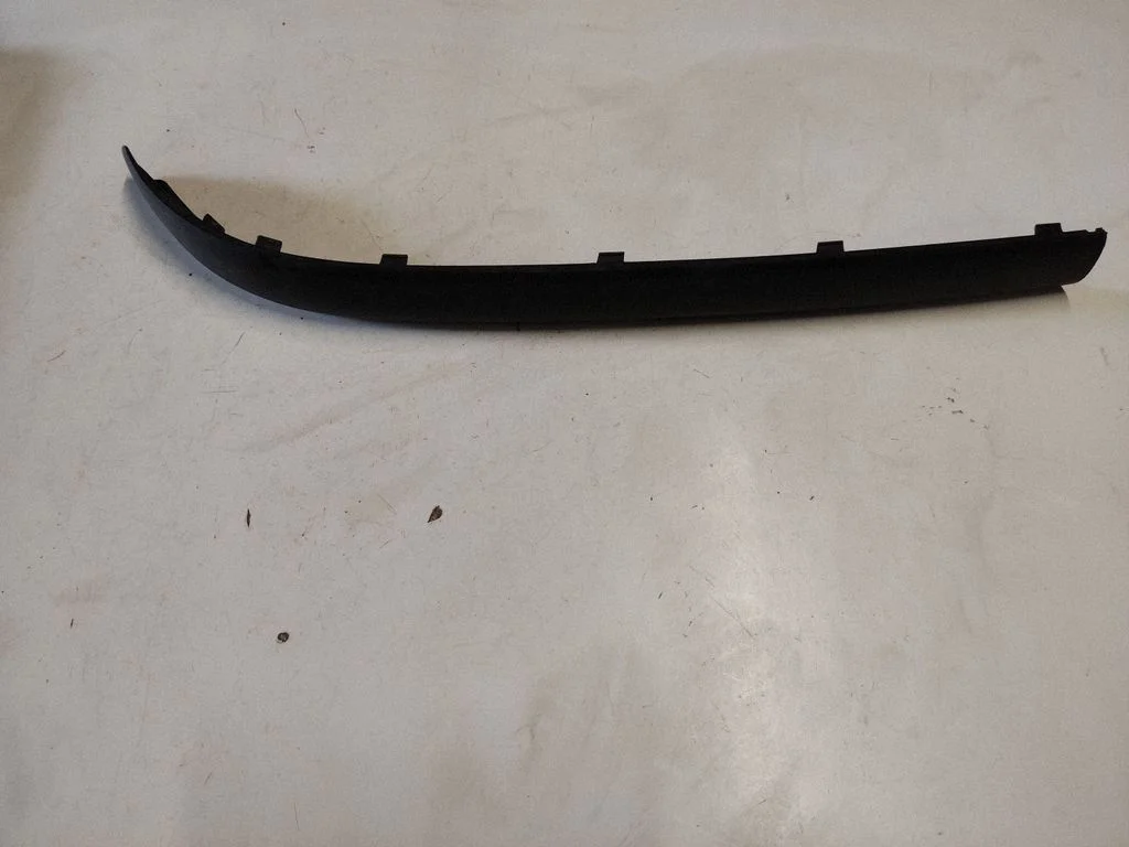 Front bumper splitter molding 7030607