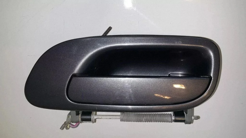 Front door interior handle – left