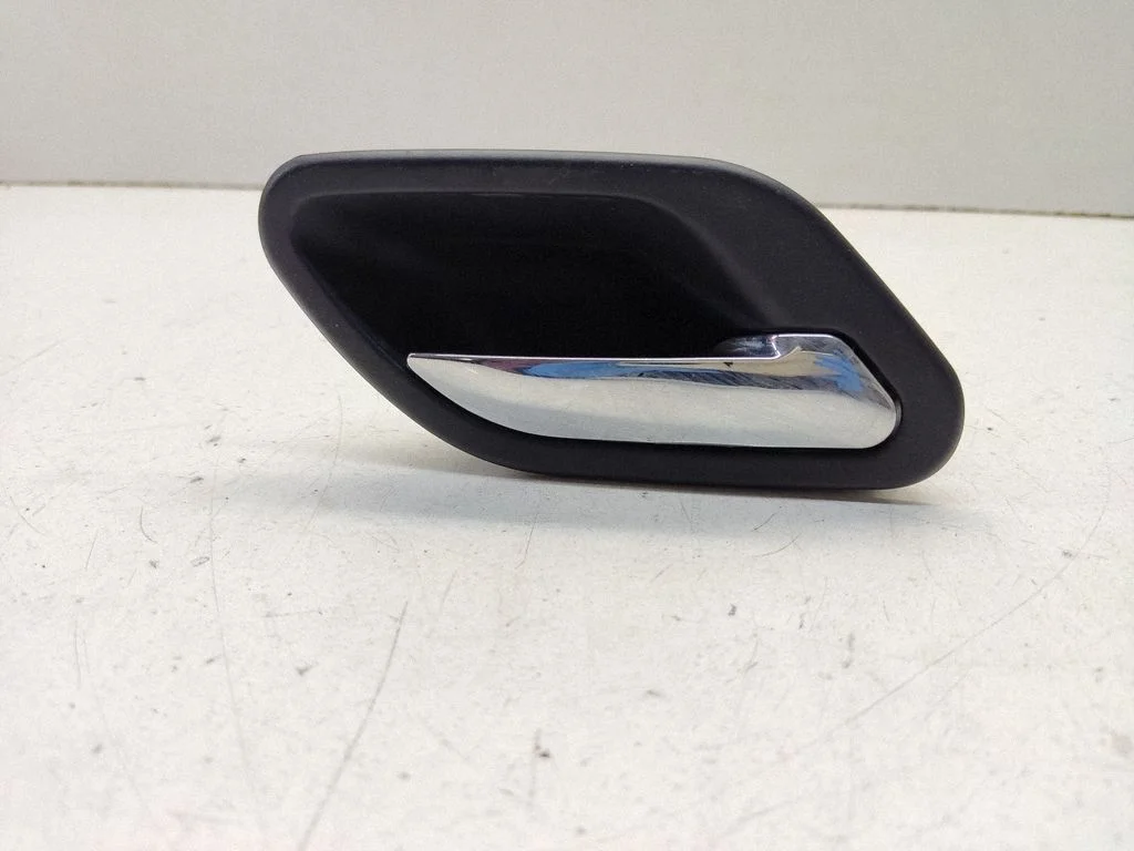 Front door interior handle 7032926