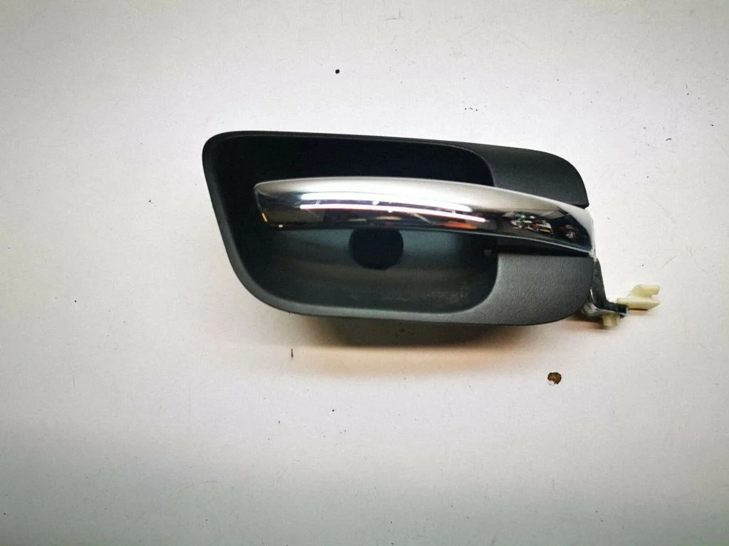 Rear door interior handle trim