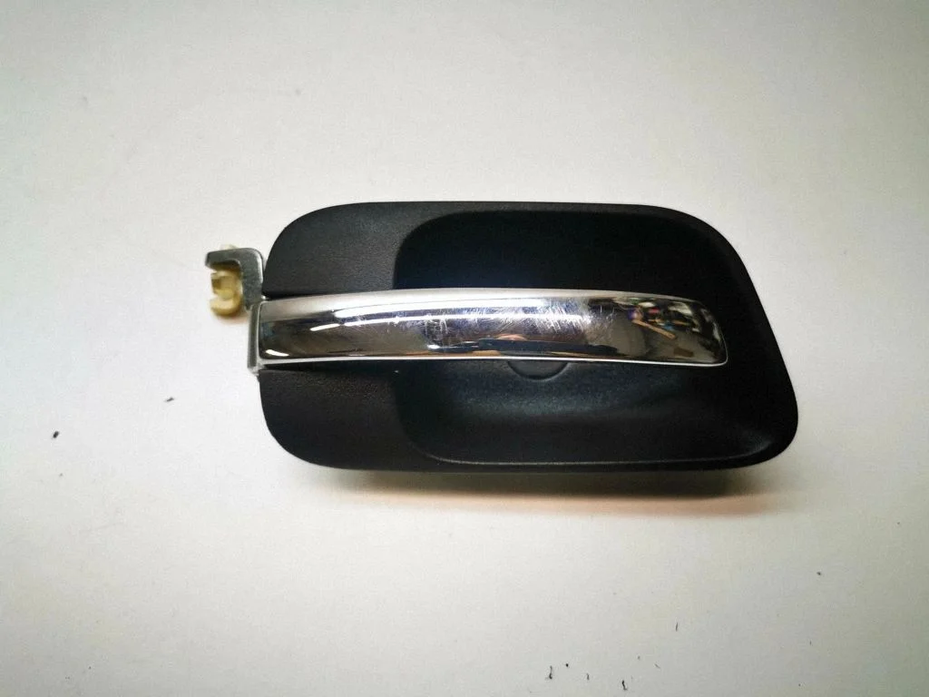 Rear door interior handle trim