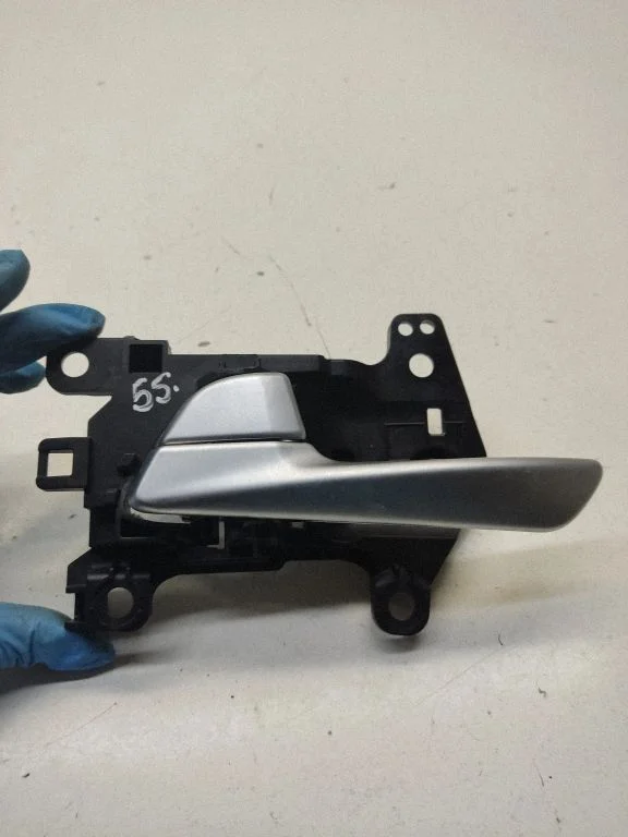 Rear door interior handle trim – rear left