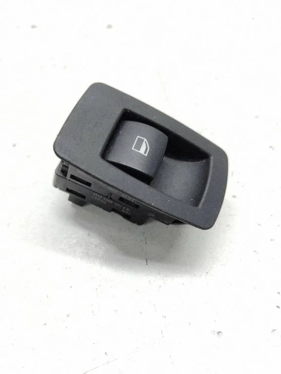 Electric window control switch 6952001