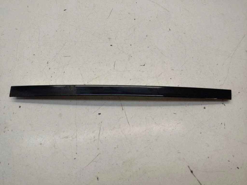 Rear door trim (molding) – rear left