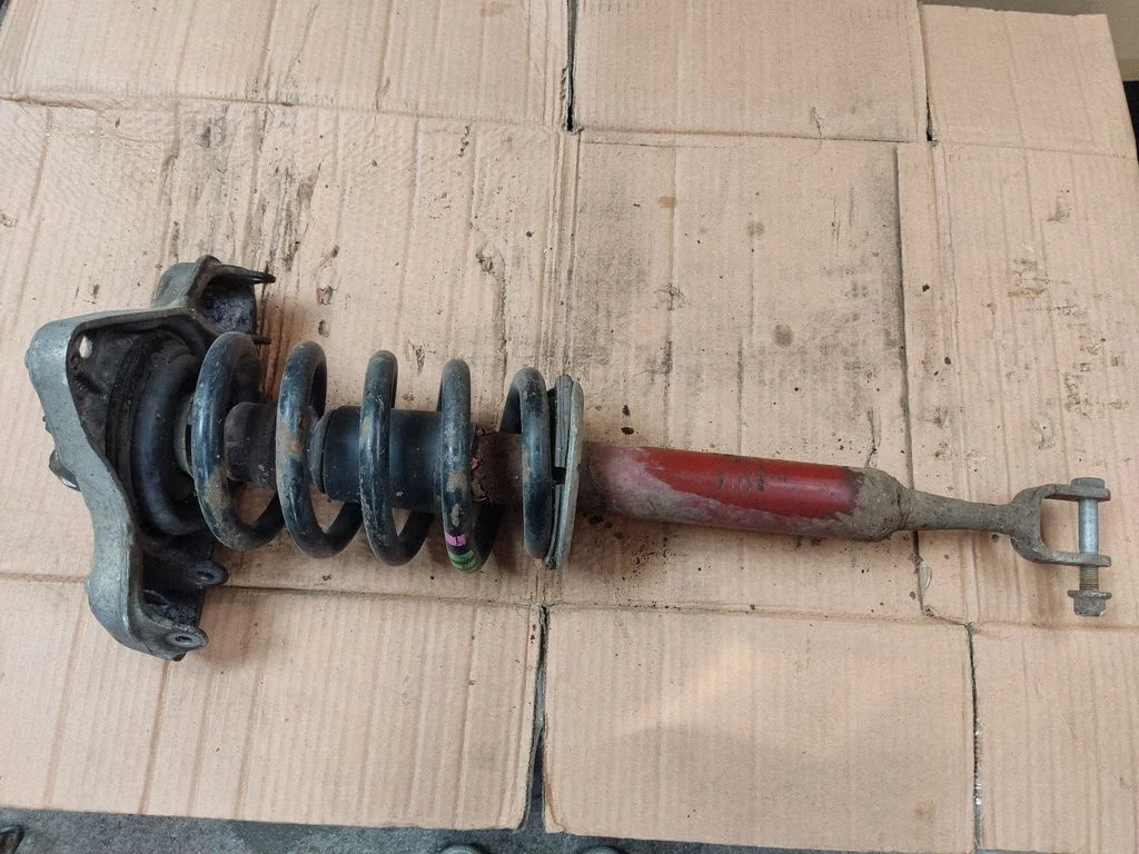 Front shock absorber with coil spring 8E0413032CL