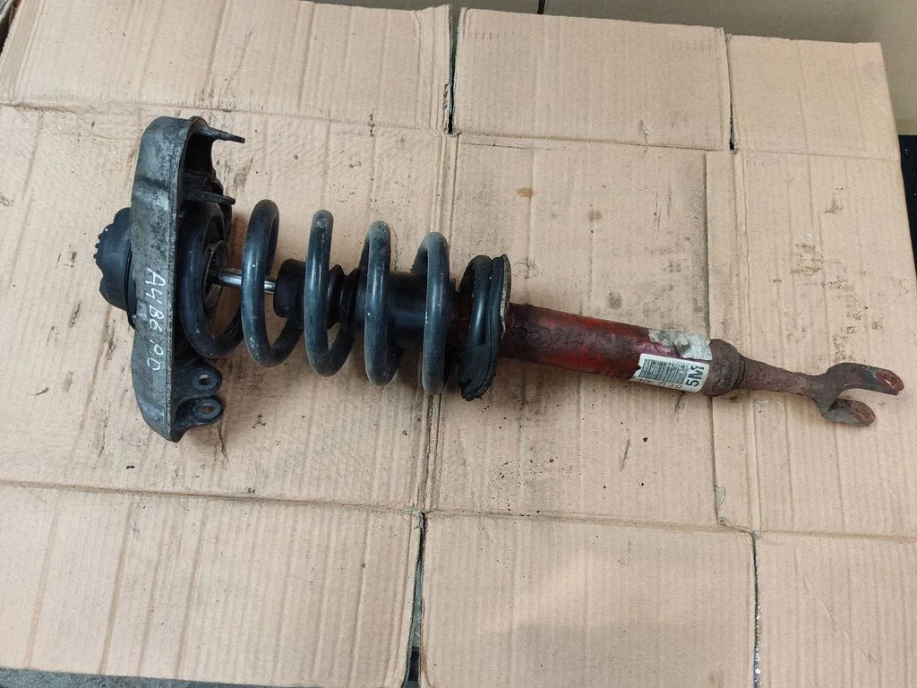 Front shock absorber with coil spring 8E0413032CL