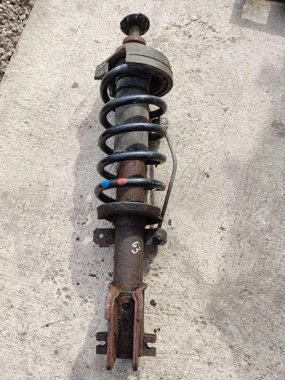 Eesmine amortisaator koos vedruga – Renault Trafic II (X83) (2001-2014)