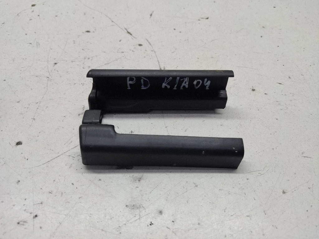 Front driver seat rail trim – right
