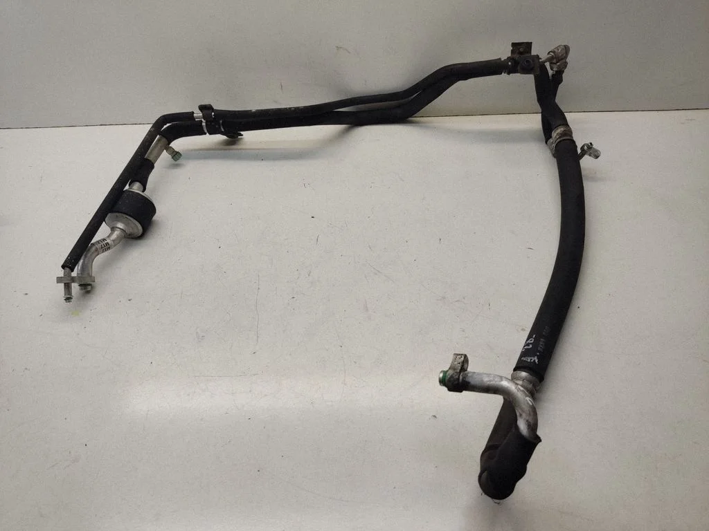 Air conditioning (A/C) pipe/hose – Hyundai Tucson JM (2004-2009)